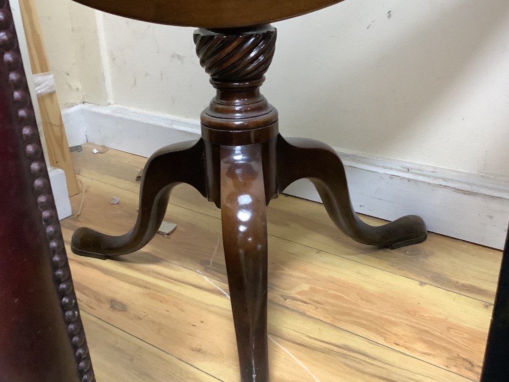 A Georgian style circular mahogany pedestal table, on tripod base, diameter 78cm height 73cm